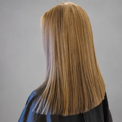 Blonde curled and pinned occasion style