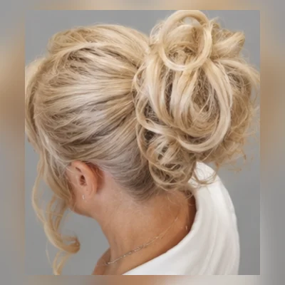 Textured blonde updo for a special occasion